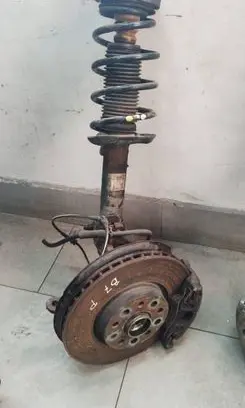 Volkswagen PASSAT B7 Front shock absorber with coil spring