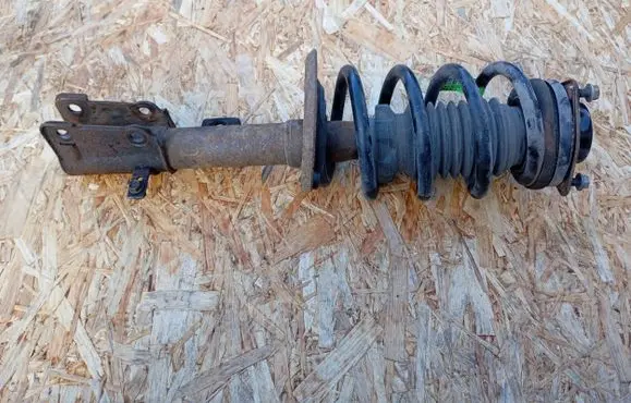 Fiat Freemont Front shock absorber with coil spring 52122724AA