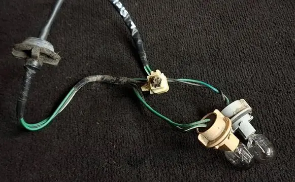 Subaru Legacy Tail light bulb cover holder