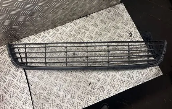 Volkswagen Touran I Front bumper lower grill 1K9853677A