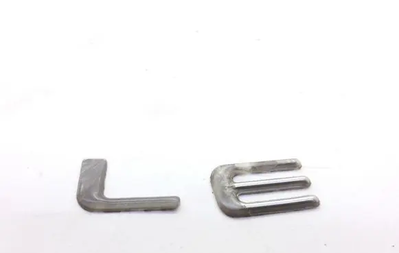 Chrysler Stratus Rear door emblem/model letters 