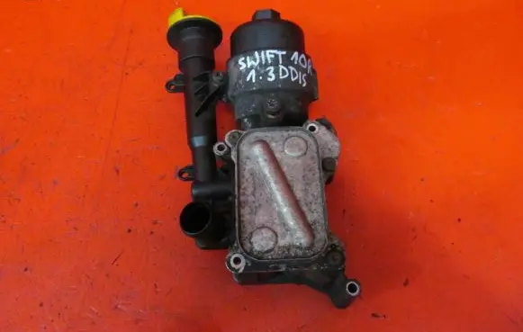 Suzuki Swift I Oil filter mounting bracket SWIFT6OBUDOWAFILTO