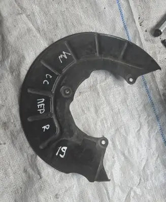 Volkswagen PASSAT CC Front brake disc dust cover plate 1K0615312F