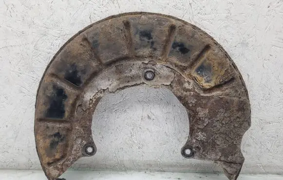 Volkswagen PASSAT B7 Front brake disc dust cover plate 