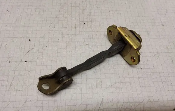Nissan Almera N16 Front door check strap stopper