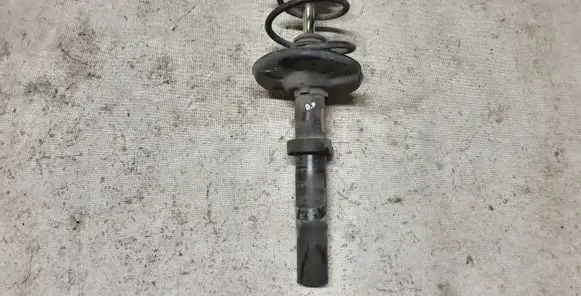 Front shock absorber with coil spring