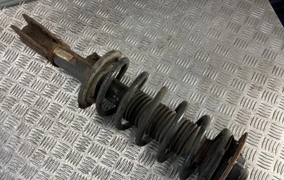 Front shock absorber with coil spring
