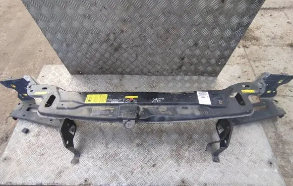 Top upper radiator support slam panel