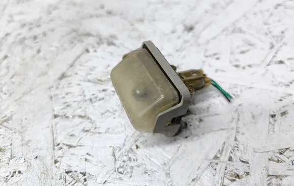 Mazda 6 Number plate light 13061971