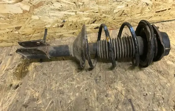 Subaru Legacy Front shock absorber with coil spring