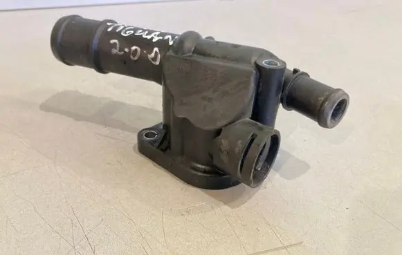 Thermostat/thermostat housing