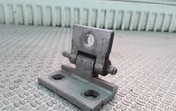 Front door lower hinge