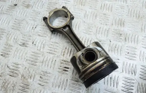 Piston with connecting rod