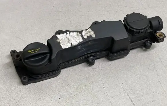 Rocker cam cover