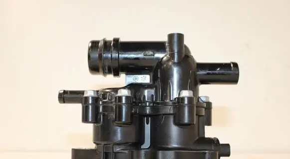 Thermostat/thermostat housing
