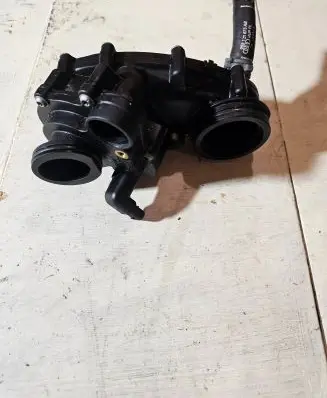 Thermostat/thermostat housing
