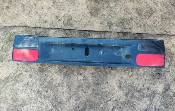 Renault Laguna I Trunk door license plate light bar 7700820049 2600 7704038277
