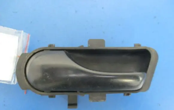 Volkswagen Polo II 86C 2F Front door interior handle