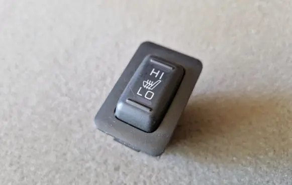 Mitsubishi L200 Seat heating switch 8610A076