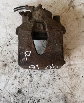 Volkswagen Golf VI Front brake caliper