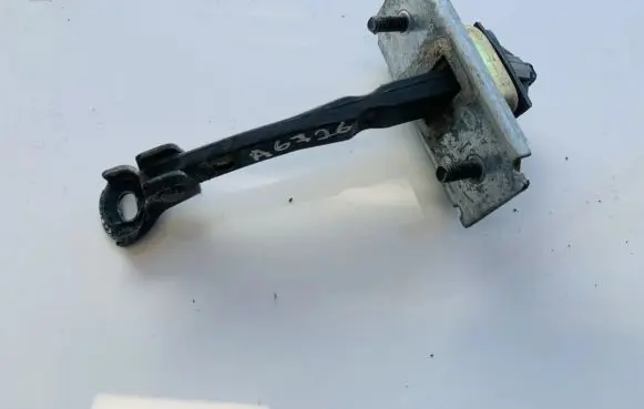 Mazda Premacy Rear door check strap stopper