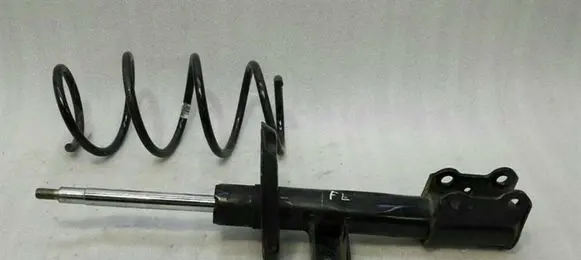 Mercedes-Benz GLA W156 Front shock absorber with coil spring A1563231900