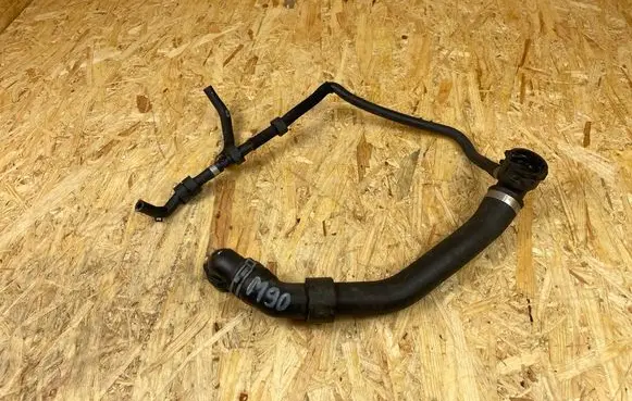 Volkswagen Golf VII Engine coolant pipe/hose 5Q0122101BK