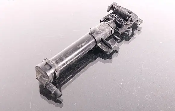 Headlight washer spray nozzle