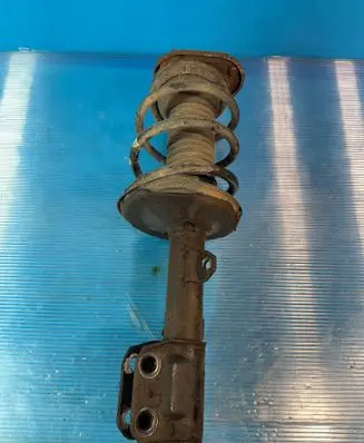 Toyota Avensis T250 Front shock absorber with coil spring