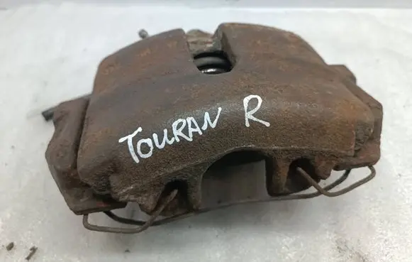 Volkswagen Touran I Front brake caliper De562