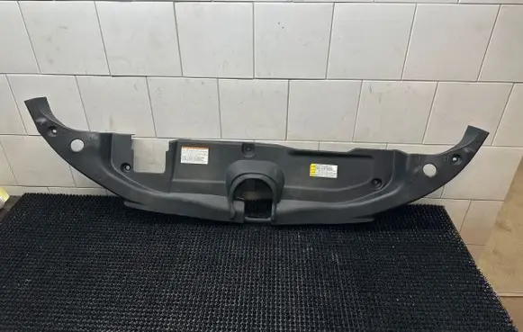 Engine bonnet/hood lock trim molding