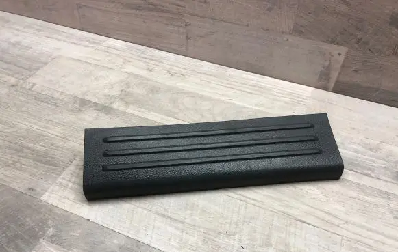 Rear sill trim cover