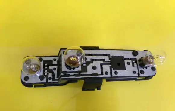 Nissan Almera N16 Tail light bulb cover holder 236873