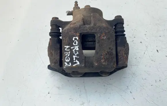 Toyota Corolla Verso E121 Front brake caliper