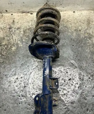 Nissan X-Trail T30 Rear shock absorber with coil spring 