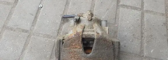 Opel Astra H Front brake caliper
