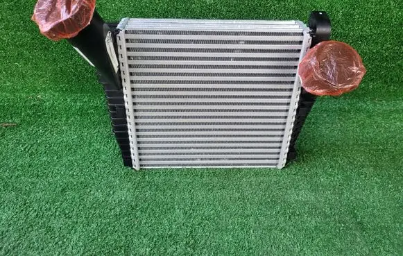 Volkswagen Touareg I Intercooler radiator 7L6145803H