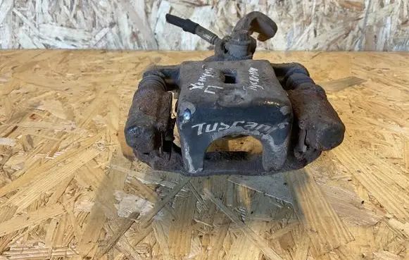 Hyundai Coupe Rear brake caliper 