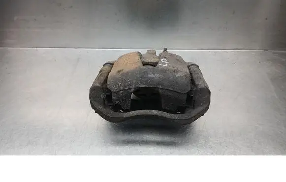 Opel Corsa D Front brake caliper 