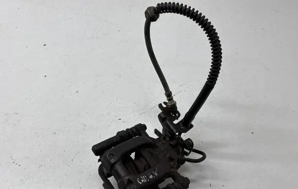 Volkswagen Caddy Rear brake caliper 