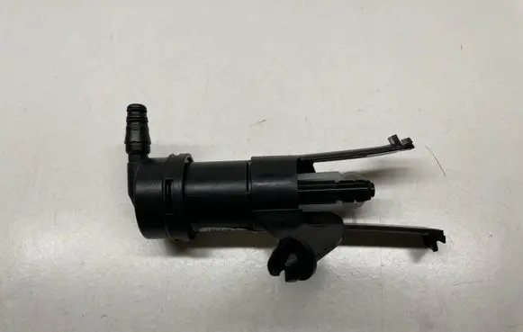 Opel Corsa C Headlight washer spray nozzle 9114699 1451253