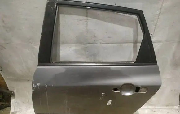 Mazda 3 I Rear door PILKOS