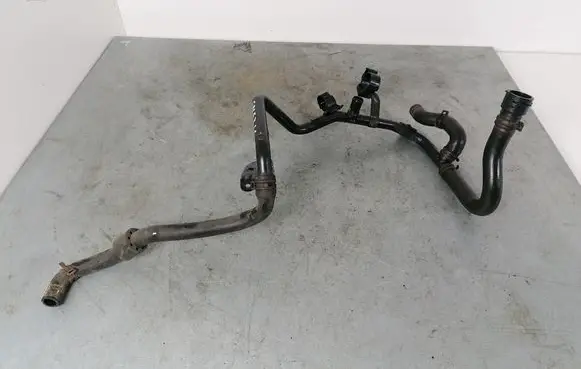 Volkswagen Golf VII Engine coolant pipe/hose 5Q0121070AH