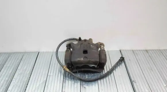 Nissan Juke I F15 Front brake caliper