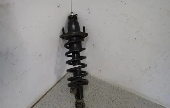 Honda FR-V Front shock absorber with coil spring 