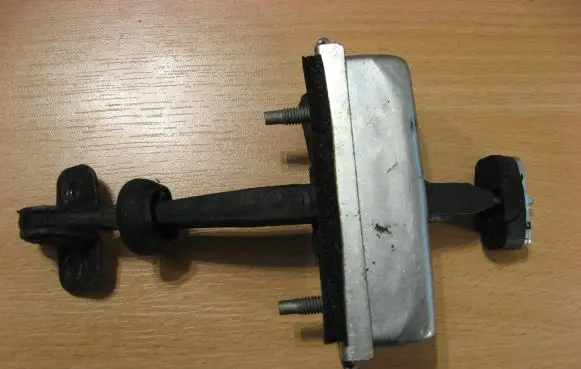 Lincoln Navigator Front door check strap stopper
