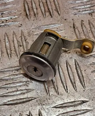 Citroen Berlingo Coupe door lock (next to the handle) 
