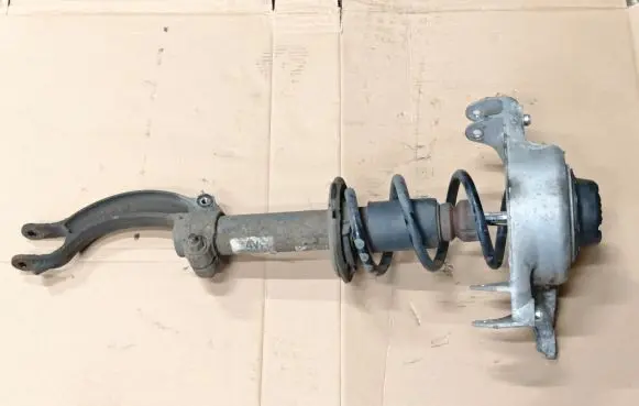 Front shock absorber with coil spring