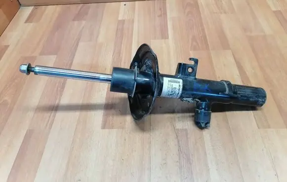 Renault Espace V (RFC) Front shock absorber/damper 543026311R
