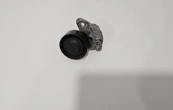 Generator/alternator belt tensioner
